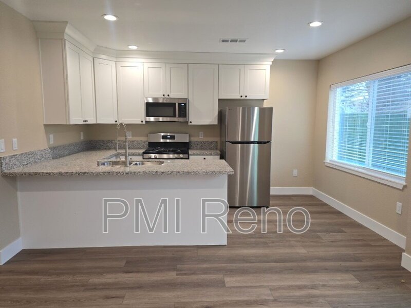 BRAND NEW Charming 2-Bed, 1-Bath Duplex Oasis in Prime Reno Location at 452 Tracy Lane! property image